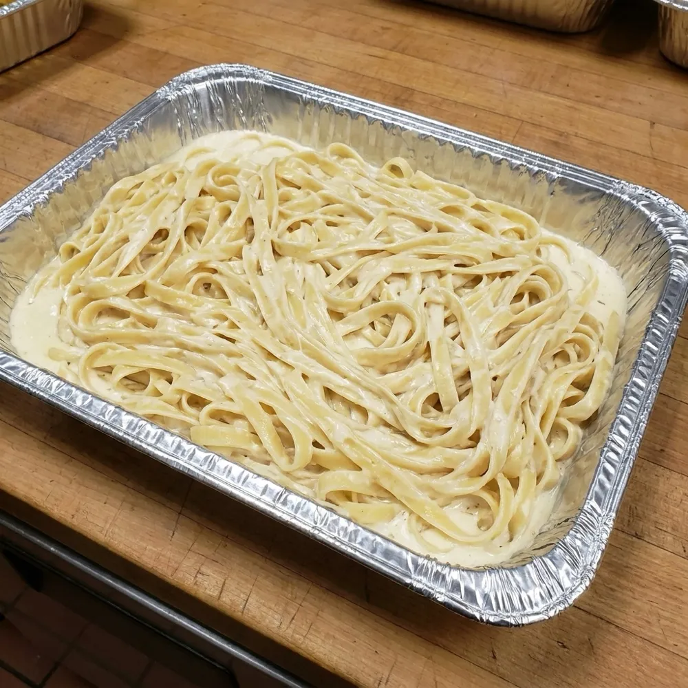 Large catering tray of fettuccine alfredo